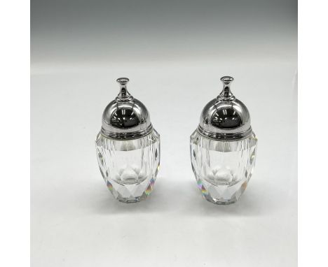 Lovely clear-cut crystal with rhodium caps. Swarovski backstamp. This item has its original box: 4"H x 5" dia. Artist: TeamIs