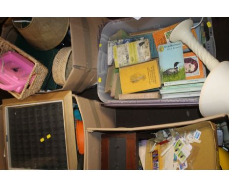 FOUR BOXES OF SUNDRIES TO INCLUDE BOOKS, A LAMP, DISPLAY CABINET ETC.