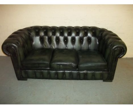 A LEATHER CHESTERFIELD THREE SEATER SOFA