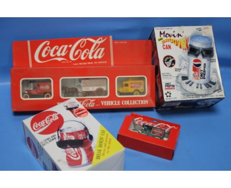 A COCA COLA BREAK DANCER'S CAN, A DIET PEPSI MOVIN' GROOVIN' CAN AND BOXED COCA COLA VEHICLESCondition Report:  The cans both