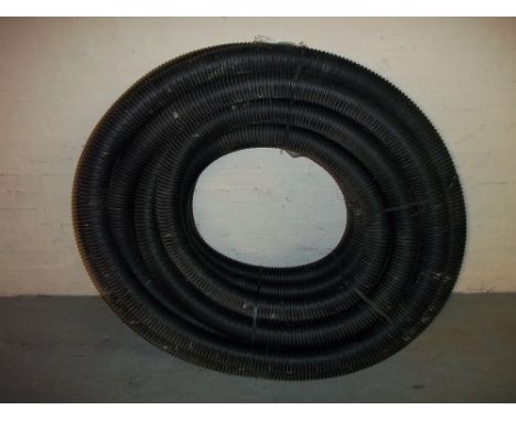 A ROLL OF 100MM DIAMETER LAND DRAINAGE PIPE