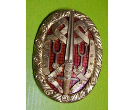 GILT METAL AND ENAMEL OVAL MASONIC BADGE