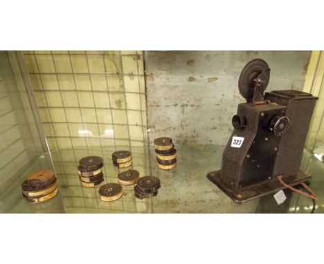 VINTAGE PATHESCOPE PROJECTOR WITH VARIOUS FILM REELS