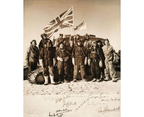 The Commonwealth Trans-Antarctic Expedition. A vintage photograph of the 12 members of Sir Vivian Fuchs's party smiling to ca