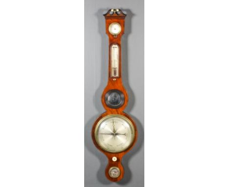 A George III mahogany wheel cased barometer, thermometer and hydrometer, with 8ins silvered dial and alcohol thermometer, con