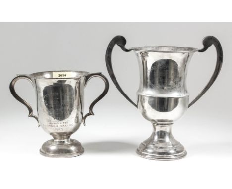 "Junior Leaders Regiment RE Inter Squadron Canoe Race" -  A 20th Century silver two-handled cup with moulded rim, scroll hand