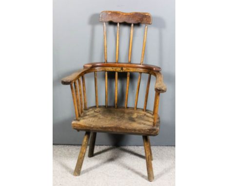 A 19th Century ash, elm and stained wood primitive two-tier stick back Windsor armchair (probably of West Country origin) wit