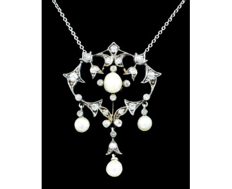 A 20th Century white and yellow gold mounted diamond and pearl pendant of open scroll form, set with twenty-seven old cut dia