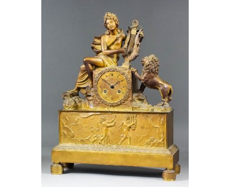 A 19th Century French ormolu cased mantel clock, No. 886, the 3ins diameter dial with Roman numerals within floral border, to