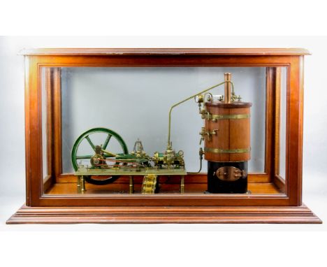 A brass and wood scratch built model of a static steam engine, 14.5ins high, in glazed mahogany case, 32.75ins x 19.75 x 18.2