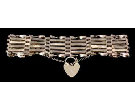 A 9ct gold six bar gate bracelet with heart pattern padlock clasp (weight 12.5 grammes)