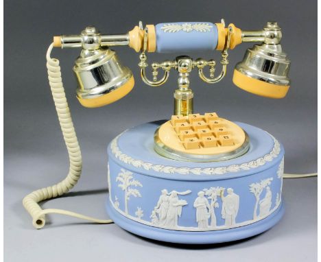 A modern Wedgwood blue jasperware telephone, the circular drum sprigged with classical figures, and with push button dial, 7.