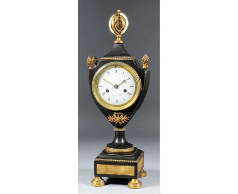 A 19th Century French bronzed and gilt brass urn pattern mantel clock, the 3.5ins diameter white enamel dial signed "D Etour 