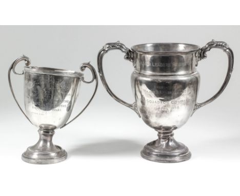 "Challenge Cup" - A George VI silver two-handled cup with reeded rim and flying scroll handles, on circular footrim, 7.25ins 