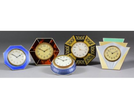 A collection of five small travelling timepieces, one with 2ins diameter gilt dial with luminous Arabic numerals, to the eigh