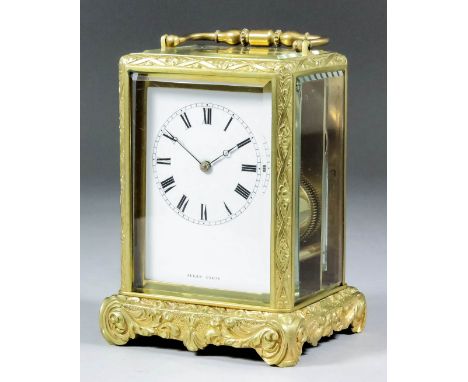 A 19th Century carriage clock by Jules of Paris, No. 192, the white enamel dial with Roman numerals, to the eight day two tra