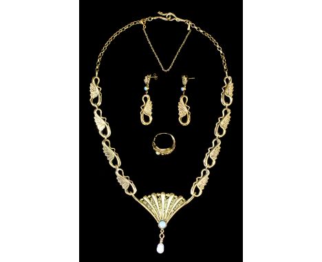 A modern 9ct gold mounted and moonstone suite by Lucy Copleston, comprising - fan shaped pendant, set with moonstone and susp