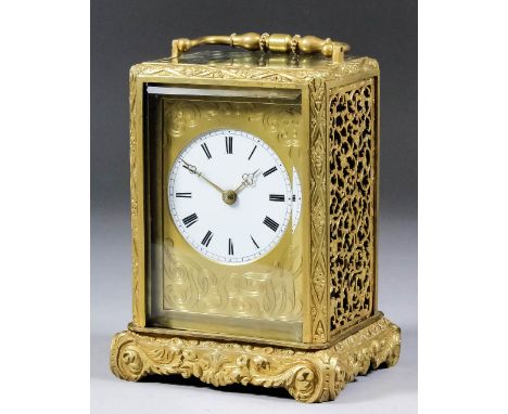 A 19th Century French carriage clock, almost certainly by Jules of Paris, the 2.25ins diameter white enamel dial with Roman n