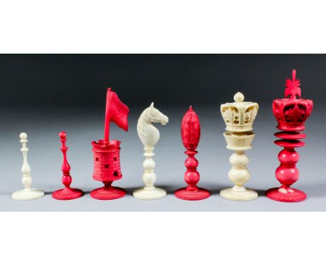 A late 19th Century turned and carved ivory and red stained ivory chess set, Kings 4.25ins high, Pawns 2.25ins high (with som