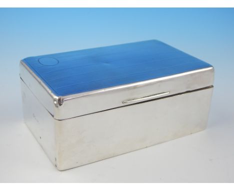 A silver cigarette box, engine turned design to top and vacant cartouche, London 1926, 14cm L