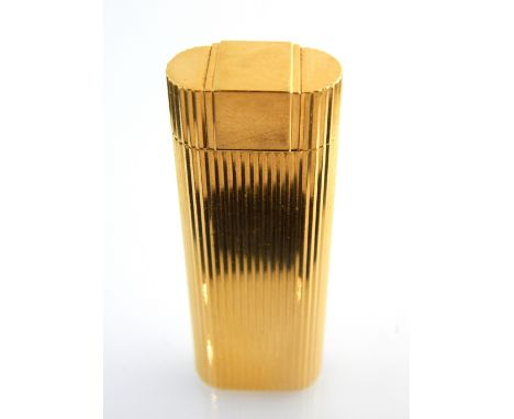 Cartier lighter, gold plated, of rectangular oval ribbed form