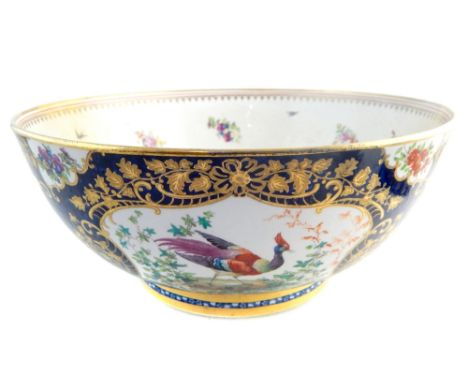 Large 19th / early 20th century Worcester style porcelain bowl, the exterior with painted bird and floral cartouches, on blue