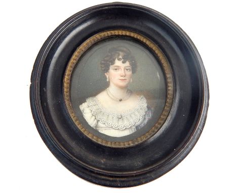 Regency oval miniature on ivory, portrait of a young lady in white lace dress with pearl jewellery, bears indistinct signatur