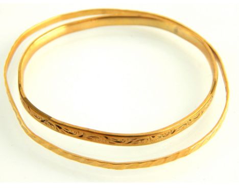 9ct yellow gold bangle, 4.7g, with a gold filled bangle, (2)