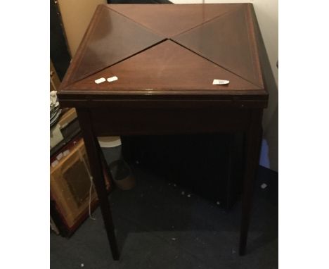 A mahogany envelope card table
