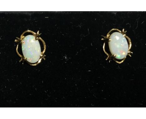 A pair of 9 ct gold and opal earrings