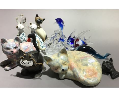 A quantity of glass and ceramic cats and other animals