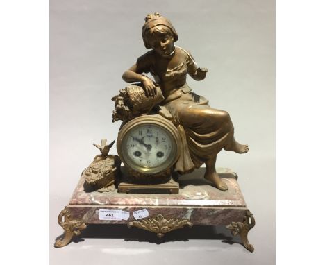 A Victorian figurally mounted marble mantle clock
