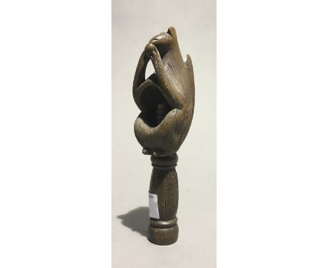 A treen nutcracker, formed as a squirrel