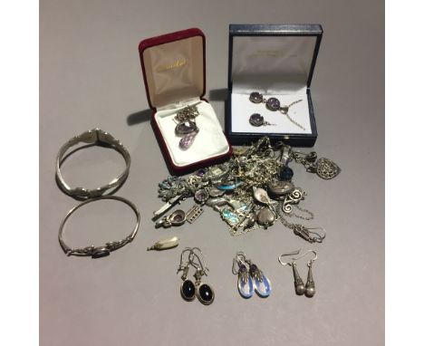 A quantity of silver jewellery, including amethyst set pendants, chains, earrings and brooches