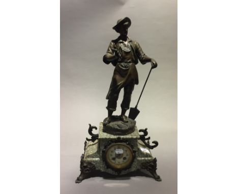 A Victorian figurally mounted marble mantle clock