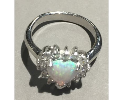 A silver and opal ring