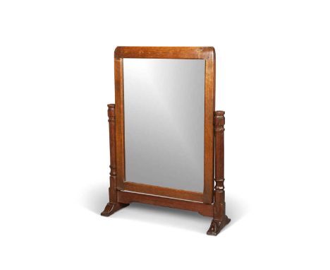 ROBERT THOMPSON OF KILBURN, AN EARLY MOUSEMAN OAK DRESSING TABLE MIRROR, CIRCA 1930-40 the rectangular mirror supported on fa