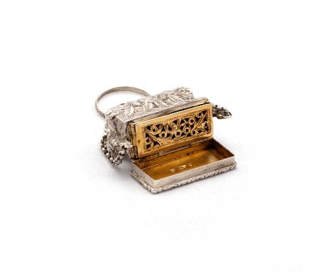 A VICTORIAN SILVER CASTLE-TOP VINAIGRETTE by Gervase Wheeler, Birmingham 1840, waisted rectangular form, the hinged cover wit