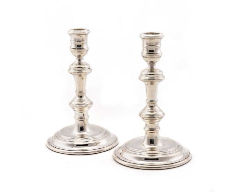 A PAIR OF ELIZABETH II SILVER CANDLESTICKS by William Comyns &amp; Sons Ltd (Richard Comyns), London 1962, both with urn-shap