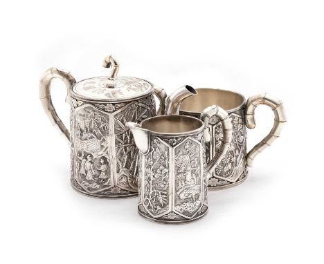 A CHINESE EXPORT SILVER THREE-PIECE TEA SERVICE artisan workshop mark of Wen, Hong Kong and Canton, comprising a teapot, two-