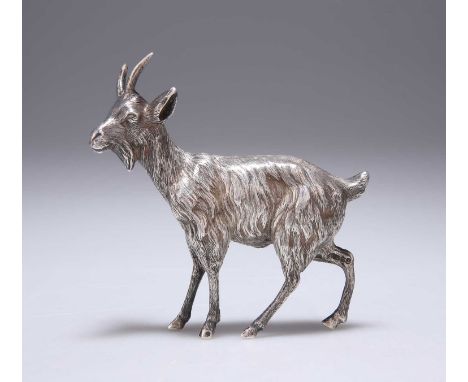 AN ELIZABETH II SILVER MODEL OF A GOAT maker's mark indistinct, London 1983, realistically modelled standing. 9.7cm high, 6.3