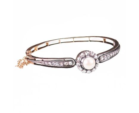 A VICTORIAN NATURAL PEARL AND DIAMOND HINGED BANGLE unmarked, the natural saltwater pearl set within a border of rose-cut dia