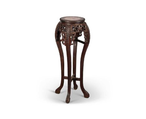 A CHINESE MARBLE-INSET HARDWOOD PLANTSTAND, LATE 19TH CENTURY the circular top with a leaf-carved edge, above a pierced and f