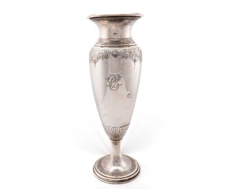 A LARGE AMERICAN SILVER VASE by Whiting Manufacturing Co., c.1900, the ovoid body flat-chased with scrolls and flowers, raise