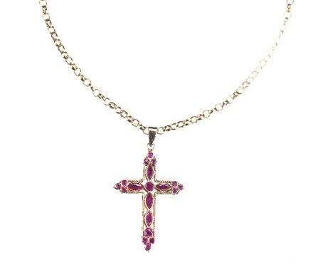 A 9 CARAT YELLOW GOLD RUBY AND SAPPHIRE DOUBLE-SIDED CROSS PENDANT marked '375', import marked, the filigree gold openwork cr