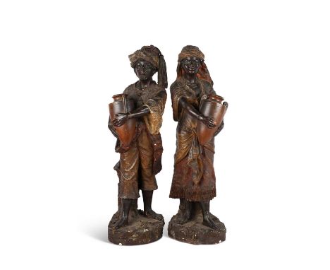 A LARGE PAIR OF COLD-PAINTED TERRACOTTA FIGURES OF ARAB WATER CARRIERS, PROBABLY GOLDSCHEIDER late 19th Century, modelled as 