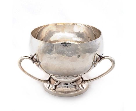 AN ARTS AND CRAFTS IRISH SILVER THREE-HANDLED BOWL by West &amp; Son, Dublin 1914, the hemispherical bowl of planished finish