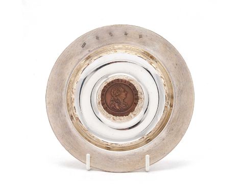 ROYAL MINT: AN ELIZABETH II BRITANNIA SILVER 'COIN' DISH by Christopher Nigel Lawrence, London 1997, inset to the well with a