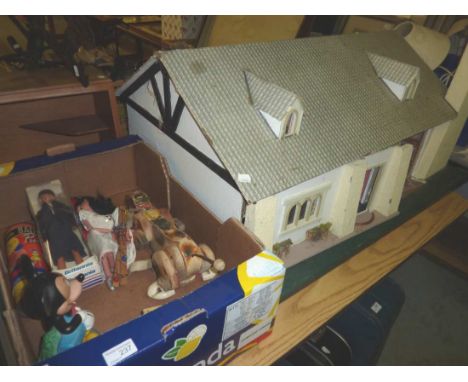 Large doll bungalow and a box of assorted toys inc Fisher Price Snoopy, puppet, jack in the box and a Mickey money box
