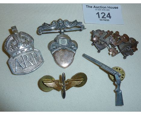 Silver and other badges, some military including hallmarked WW2 ARP badge, rifle badges and a Royal Navy silver hallmarked ba